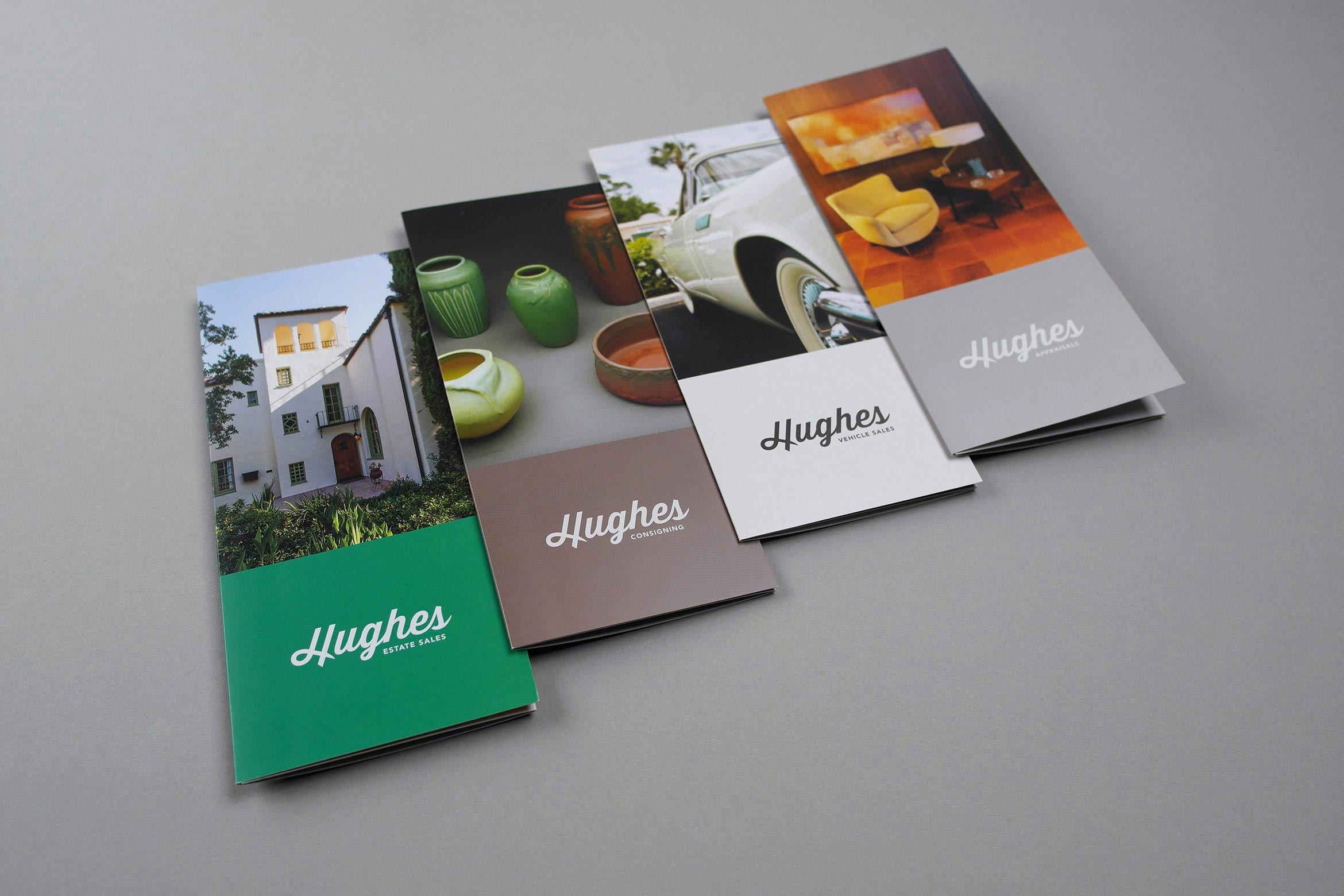 4 printed tri-gold brochures for various Hughes services