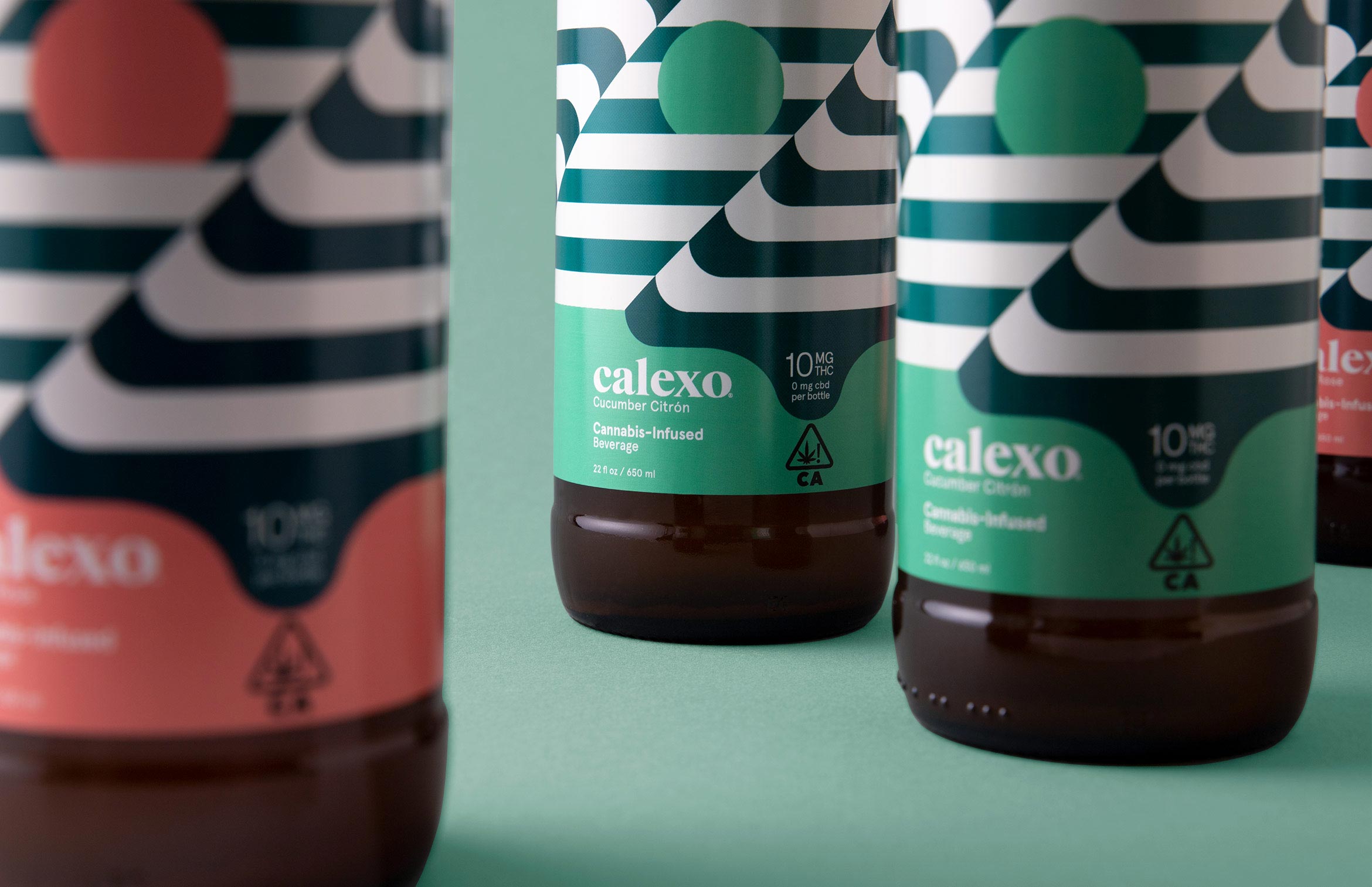 3 bottles of calexo cannabis beverage close up on label design