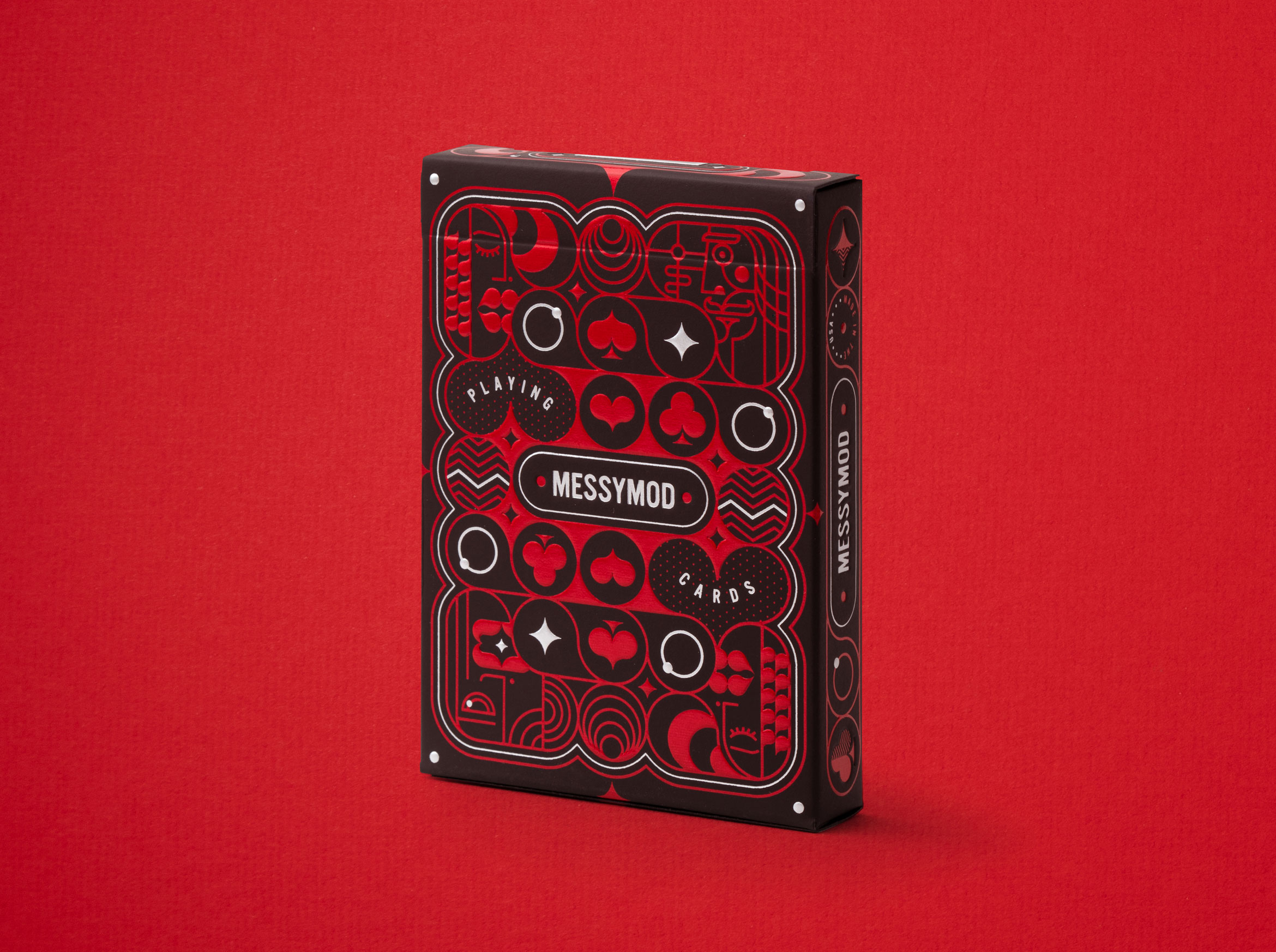 messymod playing cards box on red