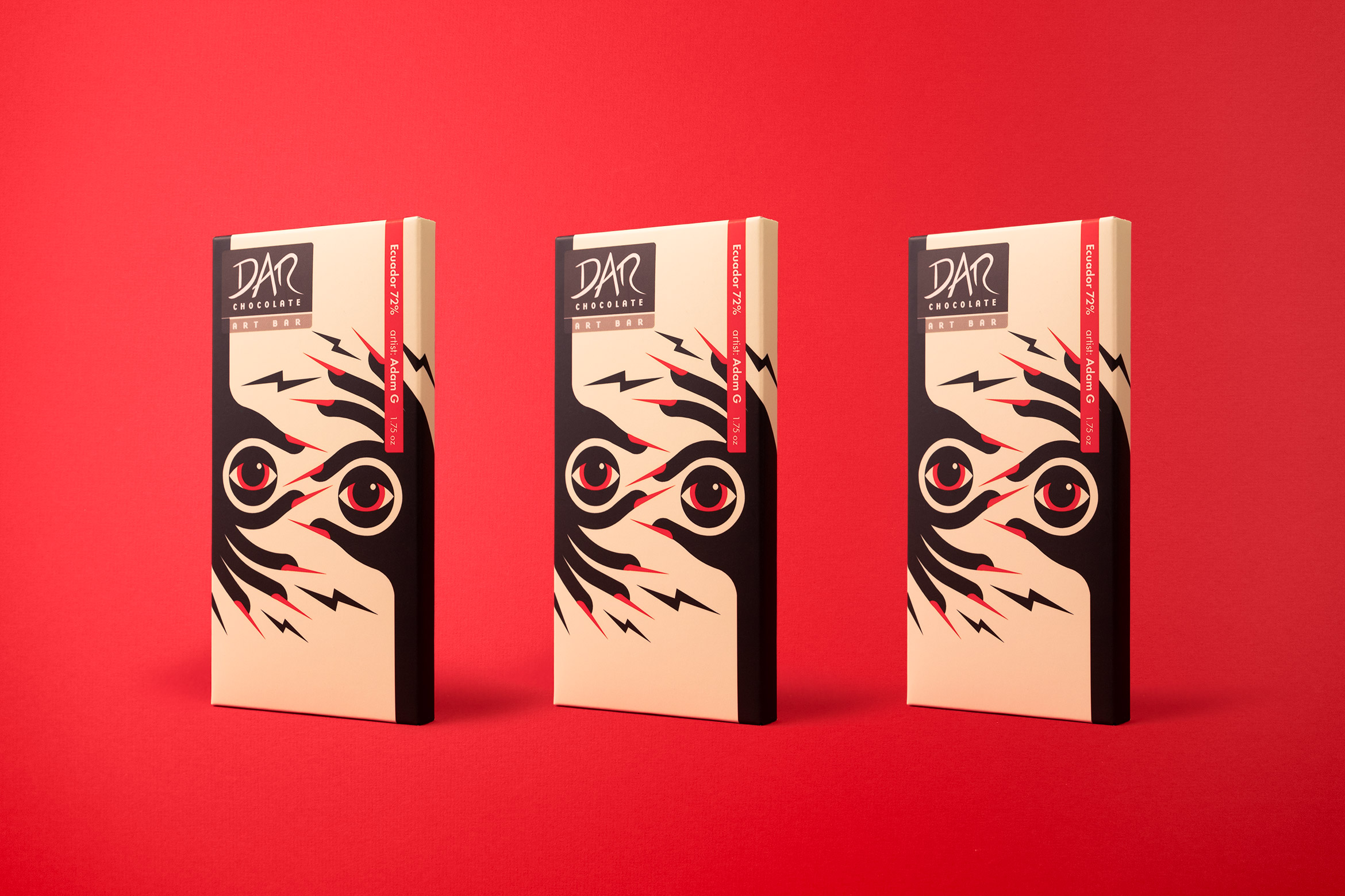 3 DAR chocolate bars with hands and eyeball design on red backdrop