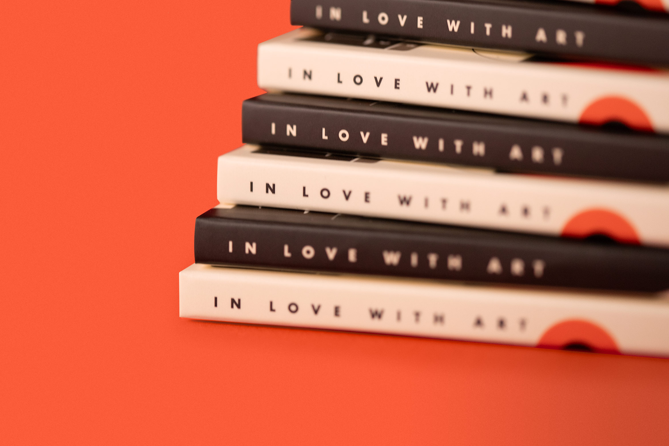 close up of spines from DAR chocolate packaging that says "in love with art"