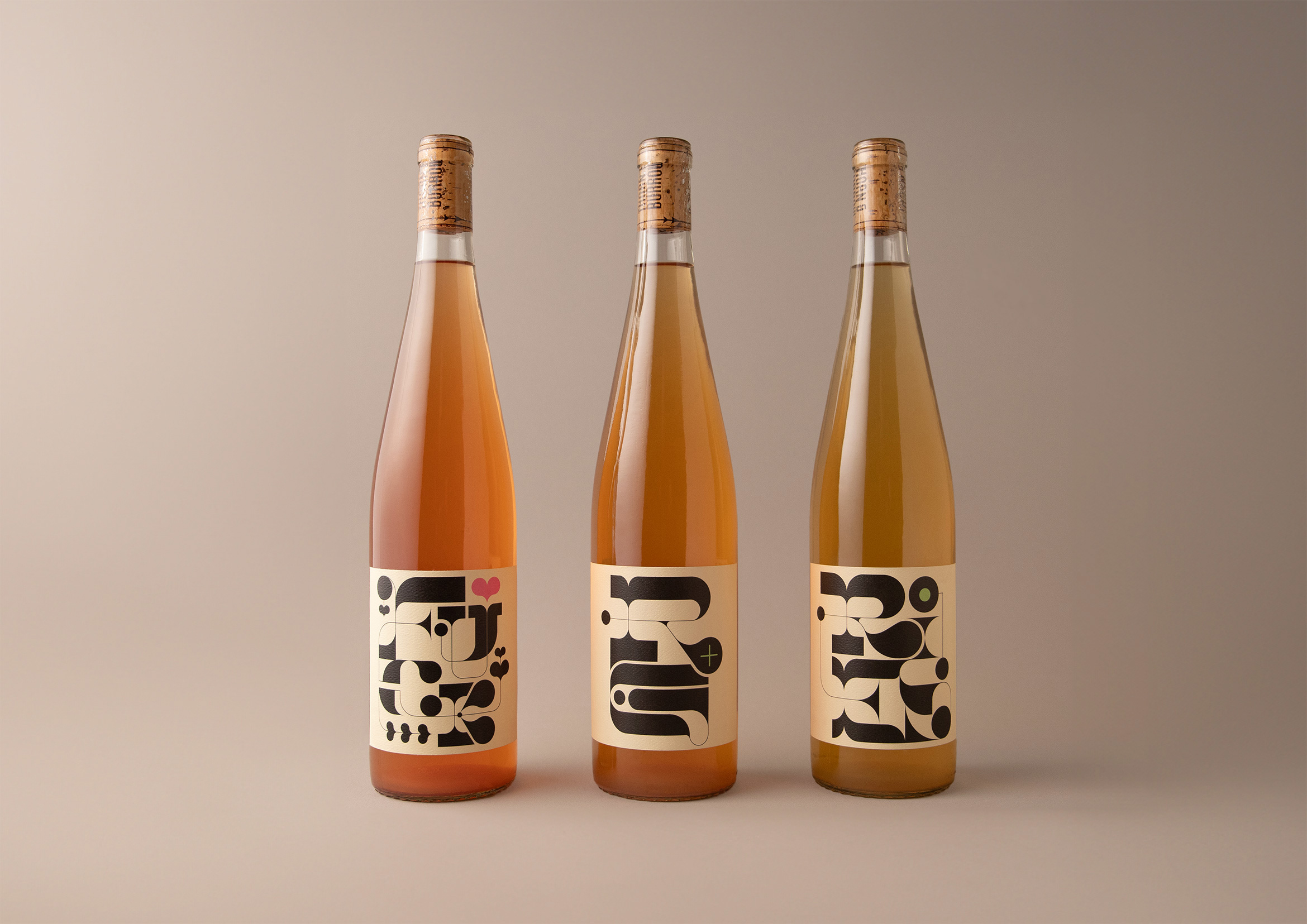 3 bottles of white wine with typographic labels