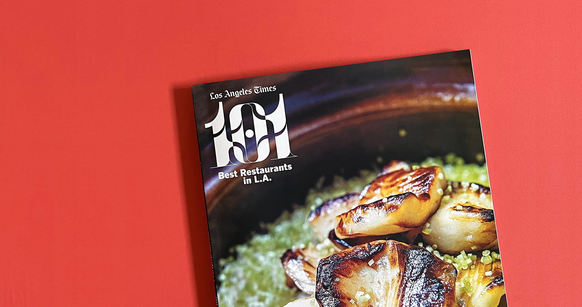 la times 101 best restaurants list magazine cover on red backdrop