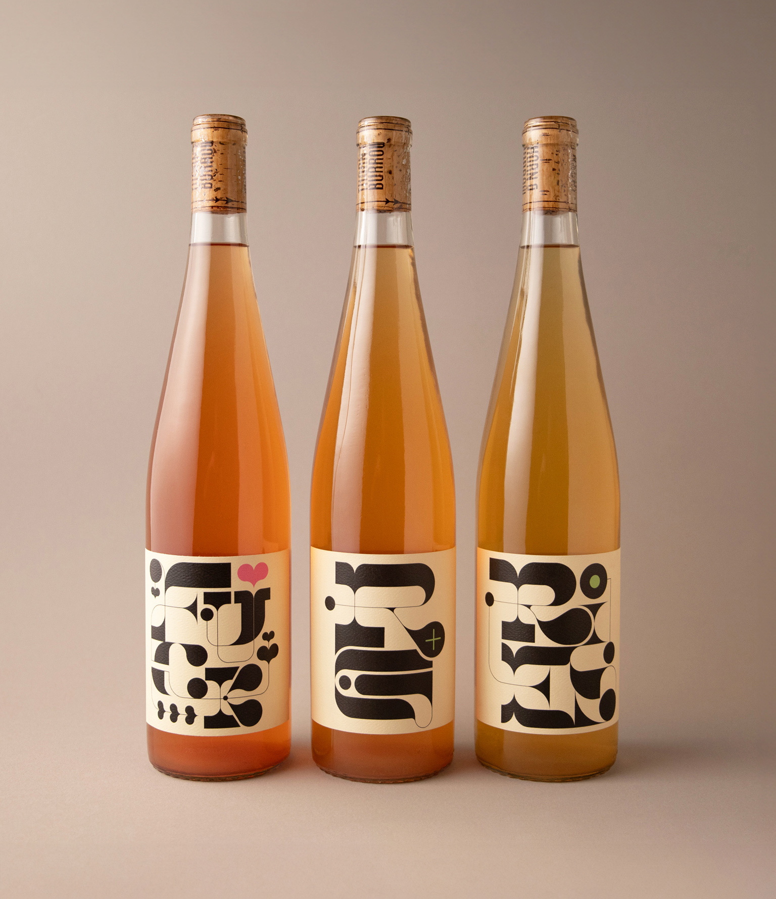 3 bottles of white wine with funky label design